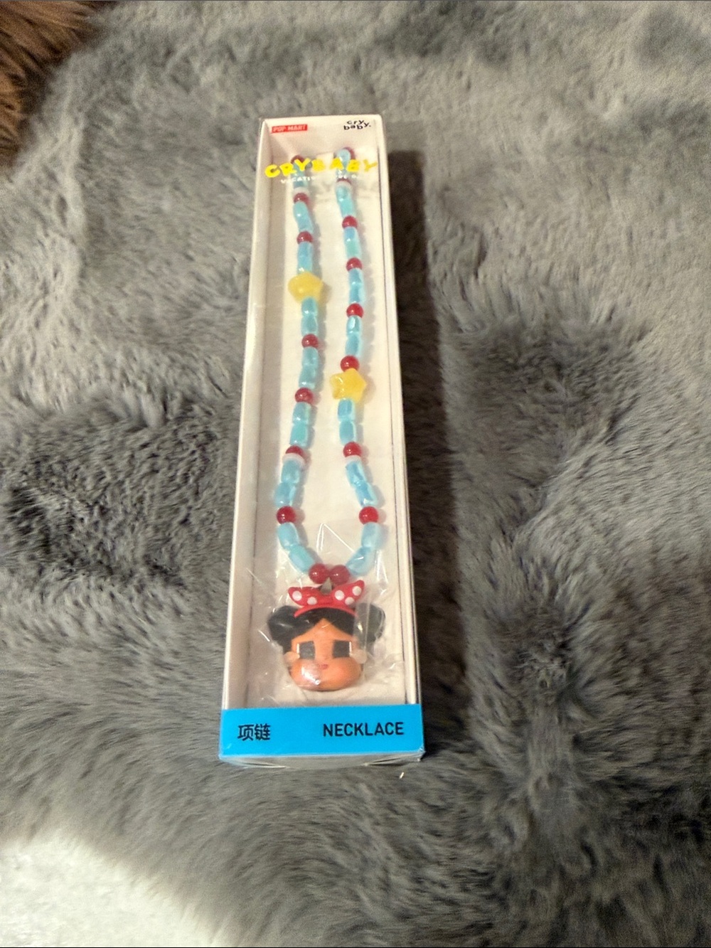 Kids Blue Beaded Character Necklace with Red Accents